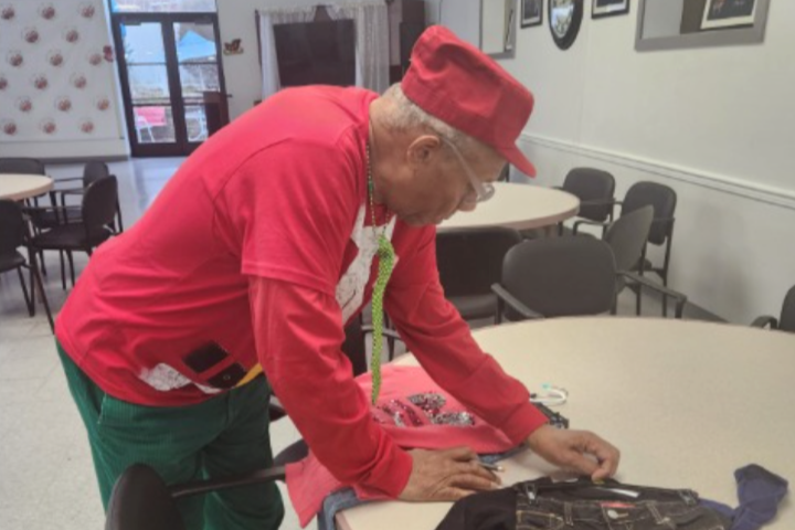 Connectedly's Outreach Coordinator collects clothing for a grandparent-headed family ahead of the holidays.