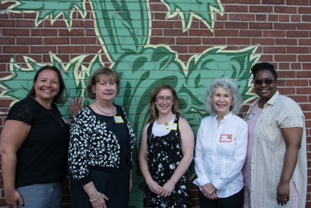 Connectedly’s team poses outside of a building at Impact100 Philadelphia's 2022 Awards Ceremony.