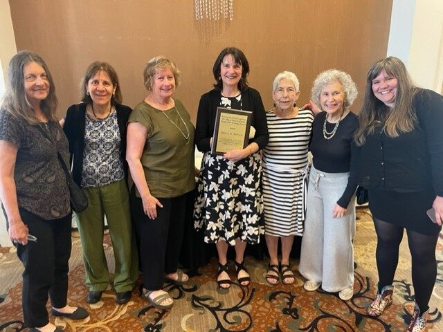 Staff and Board members pose with honoree Nancy Morrow